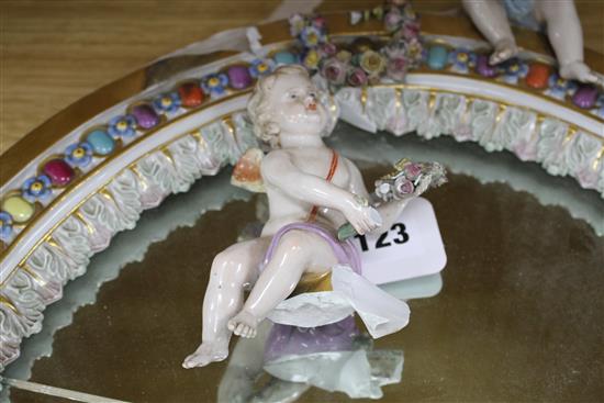 A Meissen porcelain dressing table mirror, surmounted with cherubs (a.f.), overall height 56cm